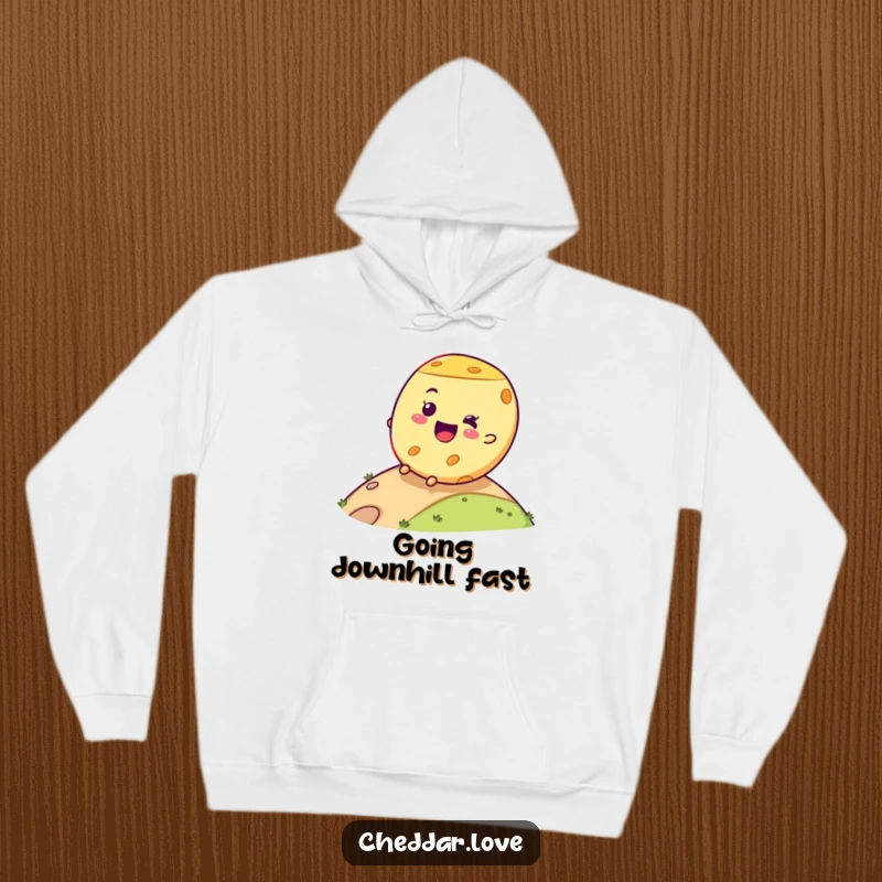 Funny cheese wheel hoodie showcasing a joyful rolling expression, perfect for cozying up with a dose of dairy-themed humor.